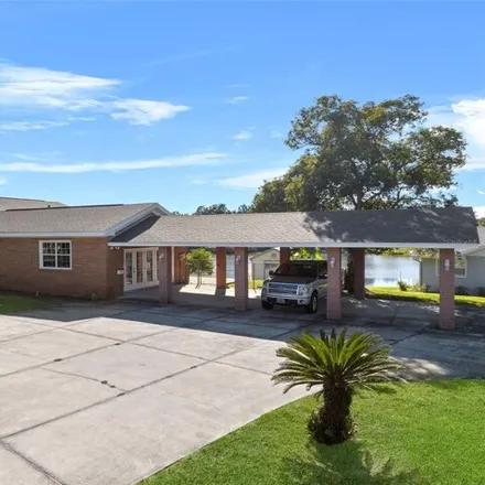 Buy this 4 bed house on 702 Delmar Street in Lake Wales, FL 33853