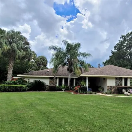 Buy this 4 bed house on 7688 West Golf Club Street in Citrus County, FL 34429