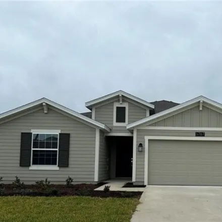 Rent this 4 bed house on Red Coral Circle in Orange County, FL 32777