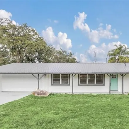 Rent this 4 bed house on 5004 Orange Boulevard in Sanford Farms, Seminole County