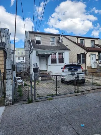 Buy this 3 bed house on 47-23 98 Pl in Corona, New York
