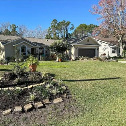 Image 2 - 13 Putter Drive, Palm Coast, FL 32164, USA - House for sale