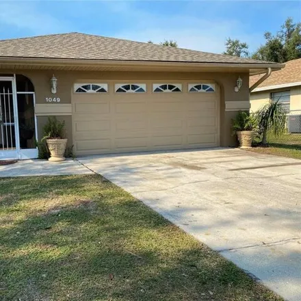 Buy this 3 bed house on 1049 Strasburg Dr in Port Charlotte, Florida