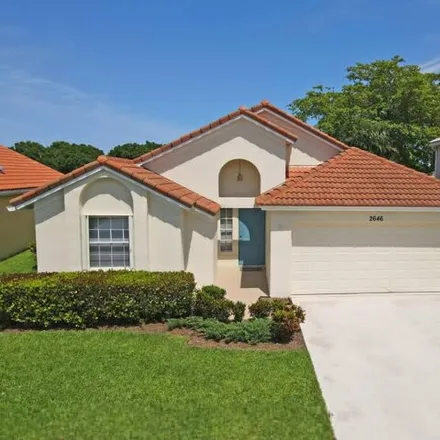 Buy this 3 bed house on 2648 Fairway Cove Court in Wellington, FL 33414