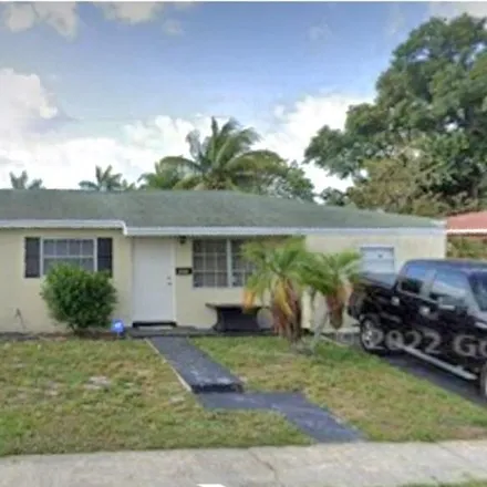 Buy this 4 bed house on 410 West 33rd Street in Riviera Beach, FL 33404