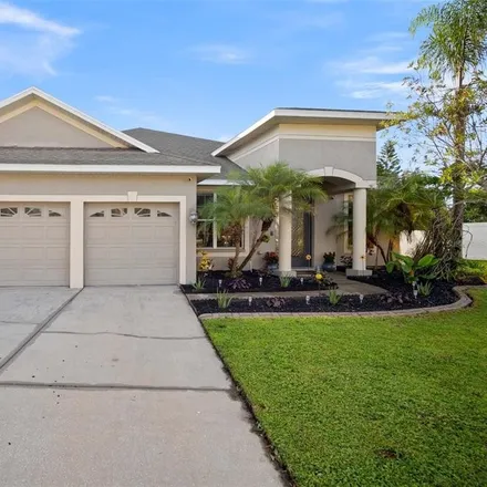 Buy this 5 bed house on 7807 Riverwood Oaks Drive in Riverview, FL 33568