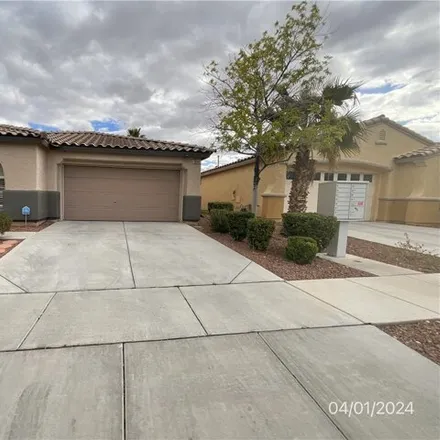 Rent this 3 bed house on 10699 April Rose Drive in Summerlin South, NV 89135
