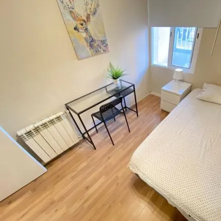 Rent this 2 bed room on Calle Vélez-Málaga in 25, 28018 Madrid