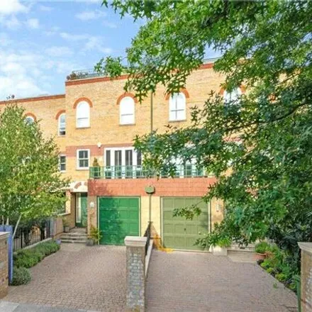 Buy this 3 bed townhouse on 13 Trinity Church Road in London, SW13 8ET