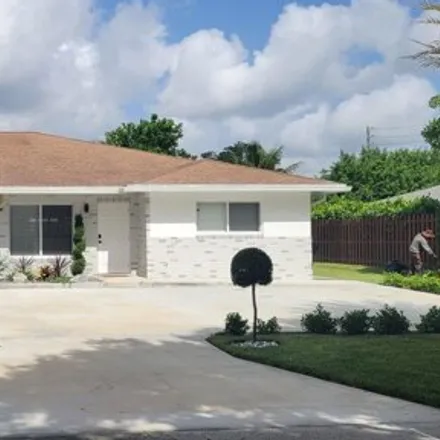 Rent this 3 bed house on 2944 Spanish Trail in Tropic Isle, Delray Beach