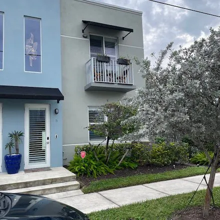 Rent this 2 bed townhouse on 1036 Northeast 43rd Street in Coral Heights, Oakland Park