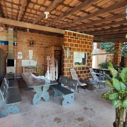 Rent this 2 bed house on Avenida Fioravante Pascholin in Jardim Bela Vista, Caraguatatuba - SP