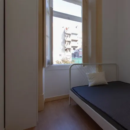 Rent this 8 bed room on CNAI in Rua Álvaro Coutinho, 1170-210 Lisbon