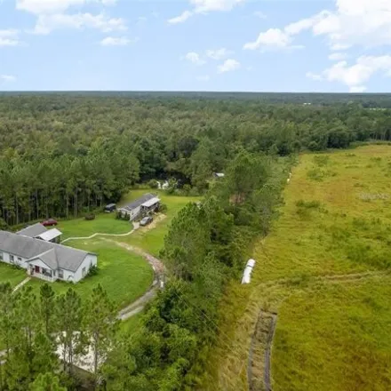Buy this 5 bed house on 7026 Oil Well Road in Clermont, FL 34711