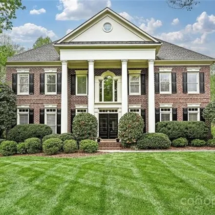 Buy this 5 bed house on 11117 Creek Pointe Drive in Matthews, NC 28105