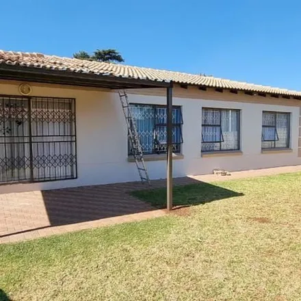 Rent this 3 bed townhouse on Springs Road in Denneoord, Brakpan