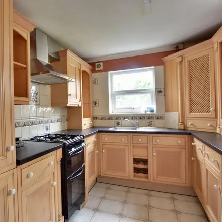 Rent this 4 bed townhouse on Glebe Road in London, UB8 2RD
