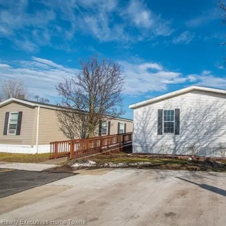 Buy this studio apartment on 48594 Lakeview Circle in Shelby Charter Township, MI 48317
