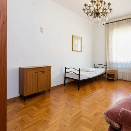 Rent this 4 bed room on Farmacia Moretti in Via Fezzan, 00199 Rome RM