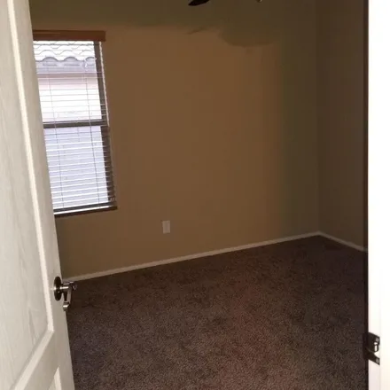 Rent this 4 bed apartment on 1238 West Dana Drive in San Tan Valley, AZ 85143