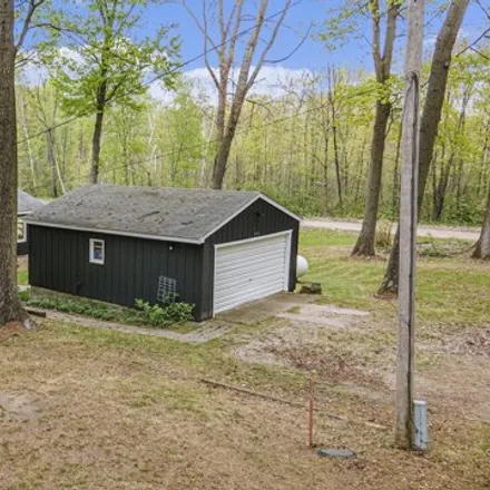Image 3 - 442 E Woodland Dr, Six Lakes, Michigan, 48886 - House for sale