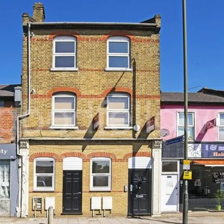 Rent this 3 bed room on Kingston Road in London, SW19 1LH
