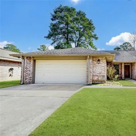 Rent this 4 bed house on 9025 Driftstone Drive in Harris County, TX 77379