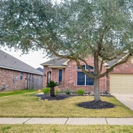 Rent this 4 bed house on 24221 Lake Path Circle in Harris County, TX 77493