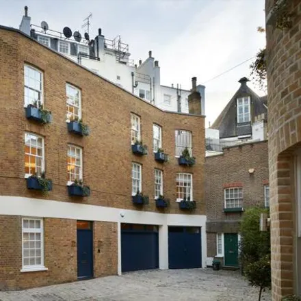 Buy this 3 bed apartment on michaeljohn in Halkin Mews, London
