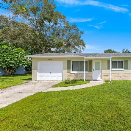 Buy this 4 bed house on 1409 West Virginia Lane in Clearwater, FL 33759