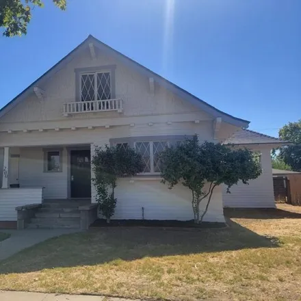 Buy this 3 bed house on 729 West 5th Street in Madera, CA 93637