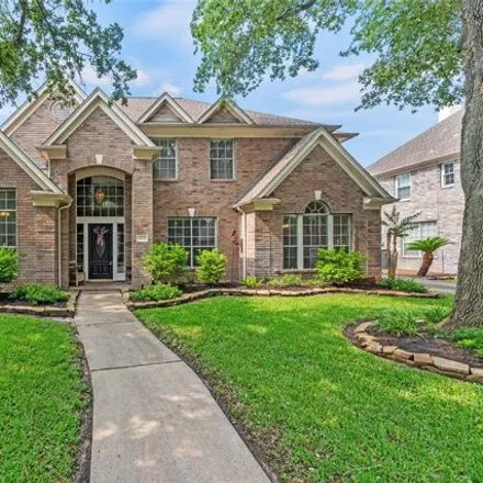 Buy this 4 bed house on 13162 Dogwood Blossom Trail in Harris County, TX 77065