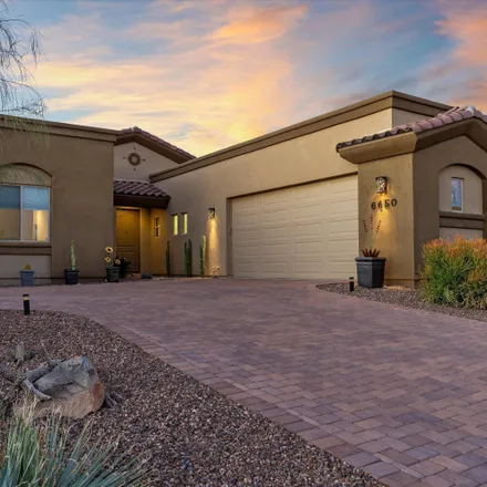 Buy this 4 bed house on 6650 West Red Hawk Place in Marana, AZ 85658