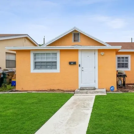 Buy this 3 bed house on 907 South B Street in Lake Worth Beach, FL 33460