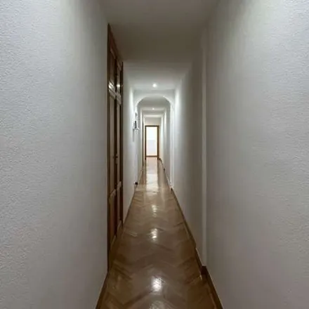 Rent this 9 bed apartment on Calle de Joaquín María López in 32, 28015 Madrid