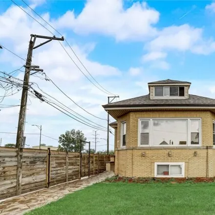 Buy this 4 bed house on 1035 West 92nd Place in Chicago, IL 60620
