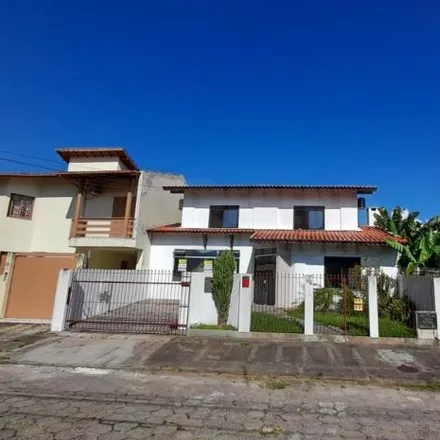Rent this 4 bed house on Rua Itabira in Itacorubi, Florianópolis - SC