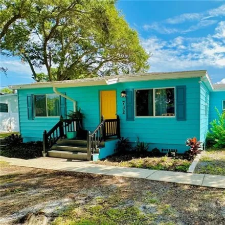 Buy this 4 bed house on Lois Bajor Fine Art- Mermaid Studio in 720 Riverside Drive, Tarpon Springs