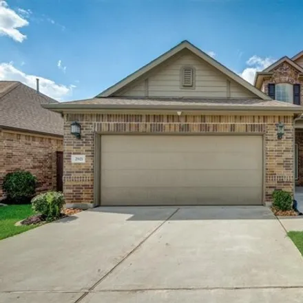 Rent this 4 bed house on 2921 Fox Ledge Ct in Conroe, Texas