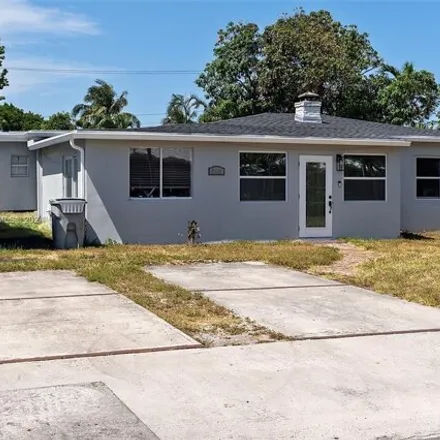Buy this 3 bed house on 3405 Robbins Rd in Pompano Beach, Florida