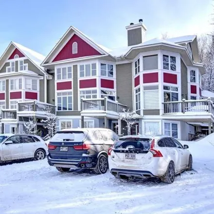 Rent this 4 bed townhouse on 152 Rue Robert in Mont-Tremblant, QC J8E 1K4