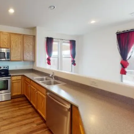 Rent this 3 bed apartment on 4868 East Desert Thorn Drive in Rancho Valencia, Tucson