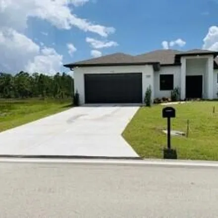 Buy this 3 bed house on 1101 West 10th Street in Lehigh Acres, FL 33972