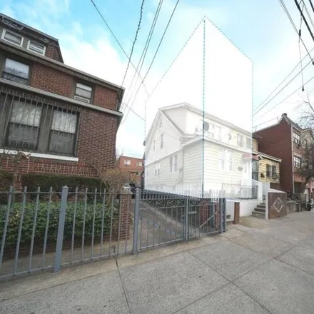 Buy this 4 bed duplex on 40-43 69th Street in New York, NY 11377