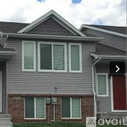 Rent this 3 bed townhouse on 3711 Marigold Drive