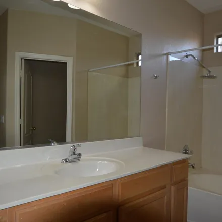 Rent this 4 bed apartment on 20946 East Sonoqui Drive in Queen Creek, AZ 85142