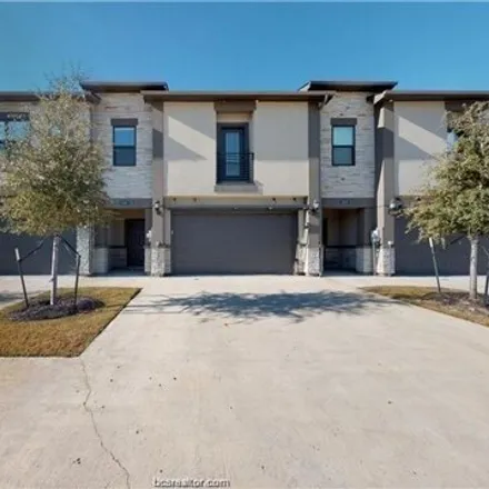 Rent this 4 bed house on 3470 Papa Bear Drive in Koppe, College Station