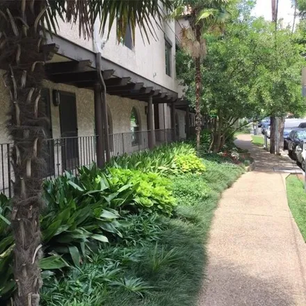 Rent this 2 bed condo on 505 W 7th St Apt 204 in Austin, Texas