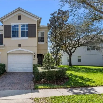 Buy this 3 bed townhouse on 5916 Strada Capri Way in MetroWest, Orlando