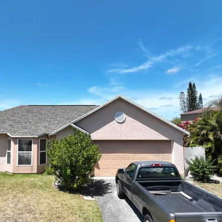 Buy this 3 bed house on 1007 Southwest Idol Avenue in Port Saint Lucie, FL 34953